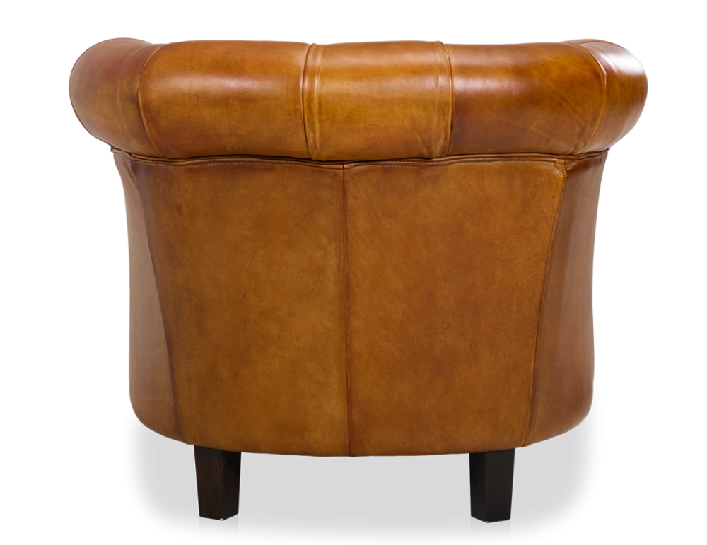 Chesterfield leather armchair cognac studded armrests Chesterfield leather armchair cognac studded armrests