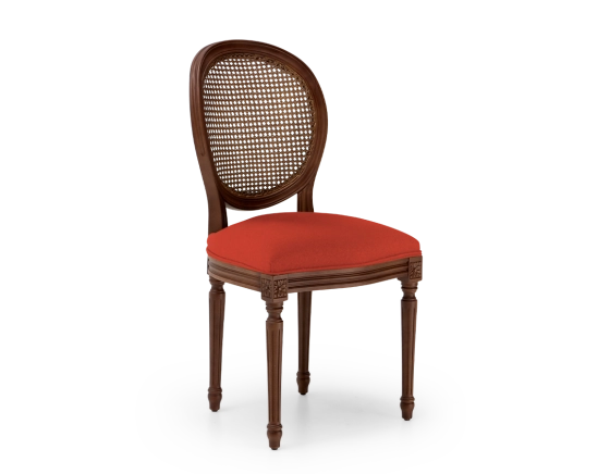 Louis XVI style antique chair dark brown stained wood with cane backrest and burnt orange fabric seat.