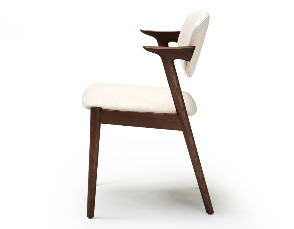 Scandinavian chair dark brown stained wood with off-white fabric seat. Scandinavian chair dark brown stained wood with off-white fabric seat.
