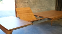 Table extensible en chêne 6 à 10 personnes avec plateau et allonges bois teinte naturelle 140x90 cm