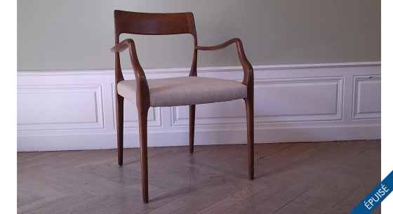 Armchairs dark brown stained wood and beige fabric