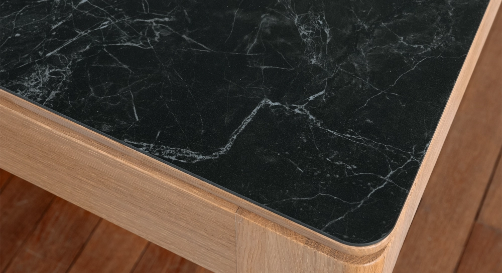 Extendable table for 8 to 10 people in oak and ceramic with wooden extensions with natural wood stain and slate effect ceramic top 180x90 cm Extendable table for 8 to 10 people in oak and ceramic with wooden extensions with natural wood stain and slate effect ceramic top 180x90 cm