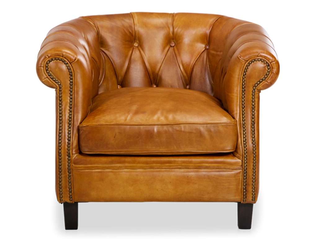 Chesterfield leather armchair cognac studded armrests Chesterfield leather armchair cognac studded armrests