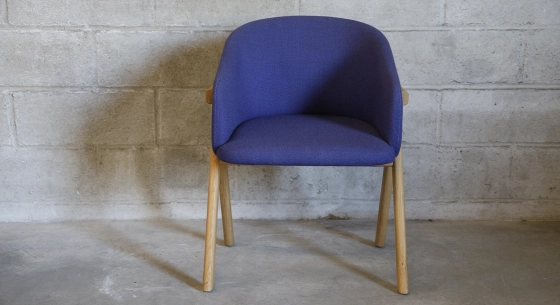 Oak chair design wood stained in xxxxx, seat upholstered in xxxxxx.