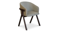 Oak chair design wood stained in xxxxx, seat upholstered in xxxxxx.