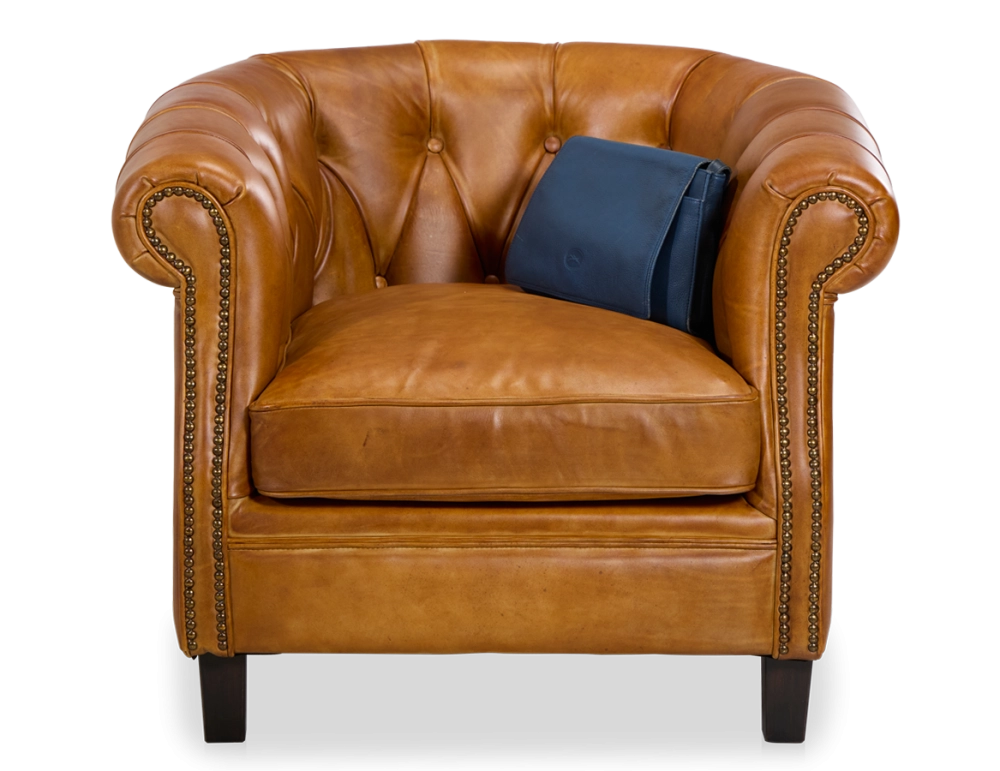 Chesterfield leather armchair cognac studded armrests Chesterfield leather armchair cognac studded armrests