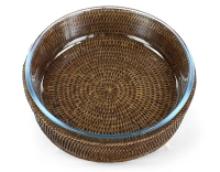 Round pyrex dish with brown rattan stand Round pyrex dish with brown rattan stand