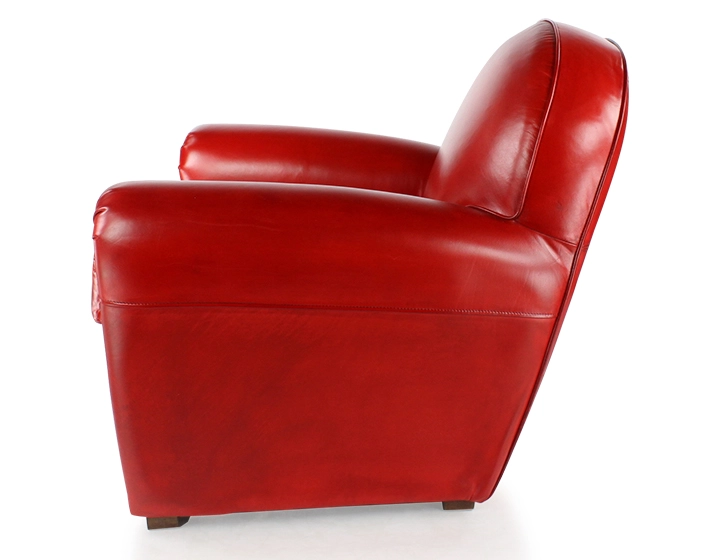Leather club armchair red studded armrests Leather club armchair red studded armrests