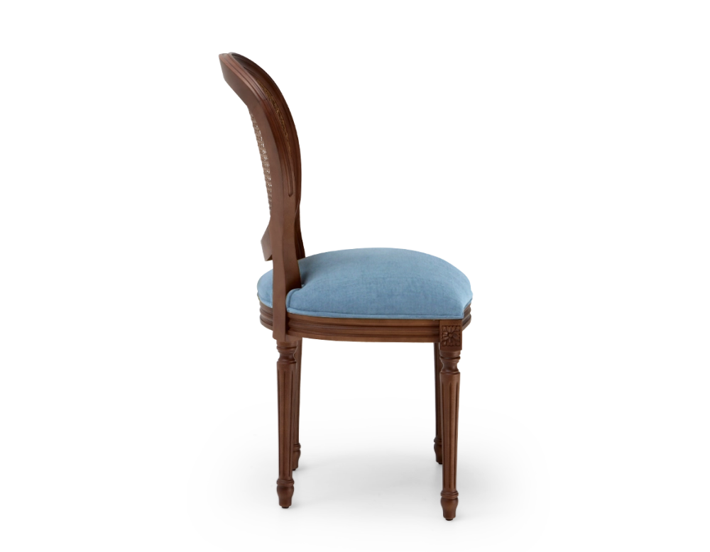 Louis XVI style antique chair dark brown stained wood with cane backrest and denim blue fabric seat. Louis XVI style antique chair dark brown stained wood with cane backrest and denim blue fabric seat.