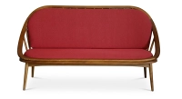 Scandinavian 2-seater sofa cherry wood stain and red fabric.