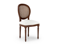 Louis XVI style antique chair dark brown stained wood with cane backrest and white bouclé fabric seat. Louis XVI style antique chair dark brown stained wood with cane backrest and white bouclé fabric seat.