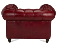 Sillón Chesterfield de piel rojo carmín reposabrazos con tachuelas