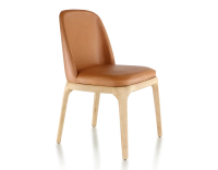 Designer chair natural stained wood and caramel leather Designer chair natural stained wood and caramel leather
