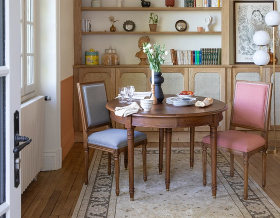 Antique Louis XVI style chair wood stained in an antique style and light grey fabric