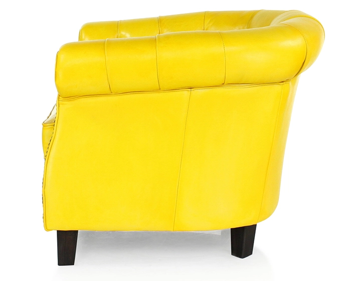 Chesterfield leather armchair yellow studded armrests Chesterfield leather armchair yellow studded armrests