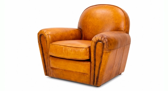Fauteuil club cuir cognac accoudoirs cloutés