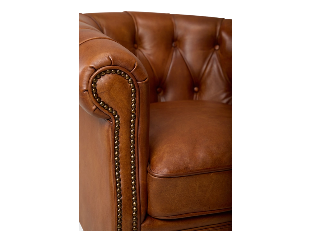 Chesterfield leather armchair light brown studded armrests Chesterfield leather armchair light brown studded armrests