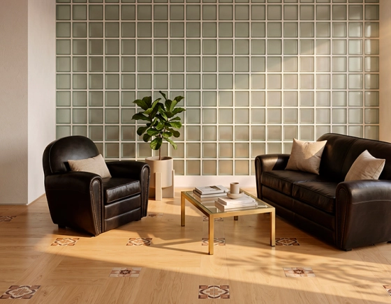 Fauteuil club cuir noir accoudoirs cloutés