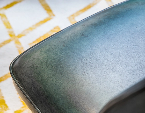 Chesterfield leather armchair blue studded armrests