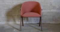 Oak chair design wood stained in xxxxx, seat upholstered in xxxxxx.