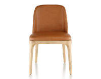 Designer chair natural stained wood and caramel leather Designer chair natural stained wood and caramel leather