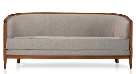 Antique 3 seater sofa with moulded armrests wood stained in an antique style and light grey fabric