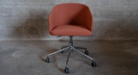 Oak chair design wood stained in xxxxx, seat upholstered in xxxxxx.