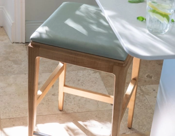H60 cm designer bar stool natural tint wood, sage green fabric seat