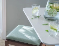 Tabouret de bar design H60 cm bois teinte noyer assise tissu vert sauge Tabouret de bar design H60 cm bois teinte noyer assise tissu vert sauge