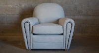 Leather club armchair dark brown studded armrests