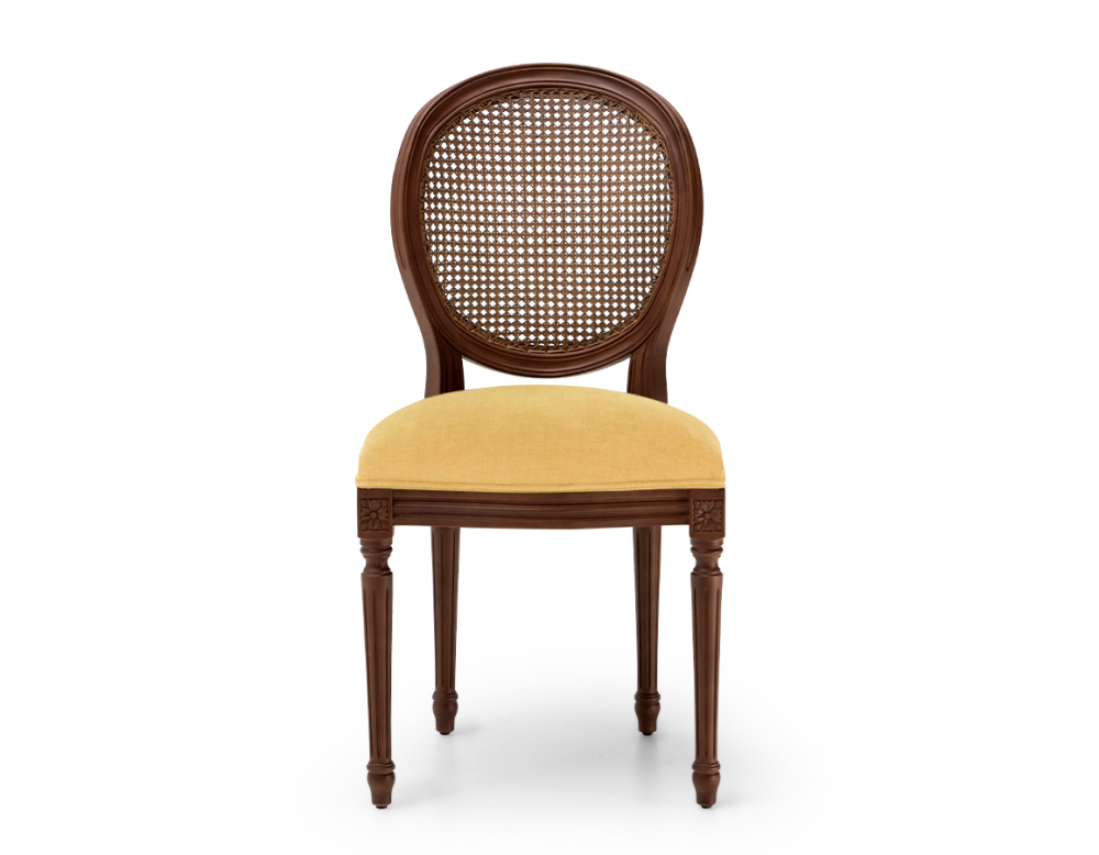 Louis XVI style antique chair dark brown stained wood with cane backrest and yellow fabric seat. Louis XVI style antique chair dark brown stained wood with cane backrest and yellow fabric seat.