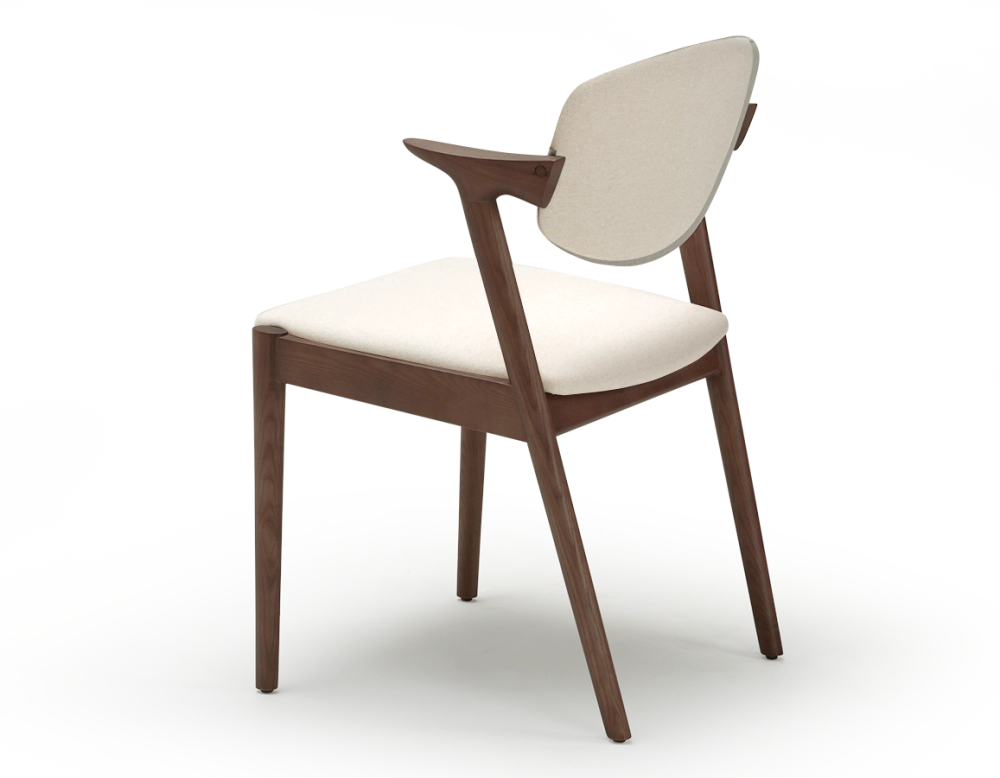 Scandinavian chair walnut-stained wood with off-white fabric seat. Scandinavian chair walnut-stained wood with off-white fabric seat.