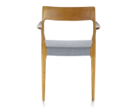Scandinavian armchair with armrests cherry-stained wood, blue chevron fabric seat Scandinavian armchair with armrests cherry-stained wood, blue chevron fabric seat