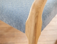Scandinavian armchair with armrests natural stained wood, blue chevron fabric seat Scandinavian armchair with armrests natural stained wood, blue chevron fabric seat