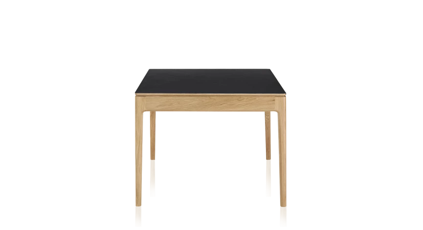 Table extensible en chêne et céramique allonges bois avec bois teinte naturelle et plateau céramique noir unie 140x90 cm
