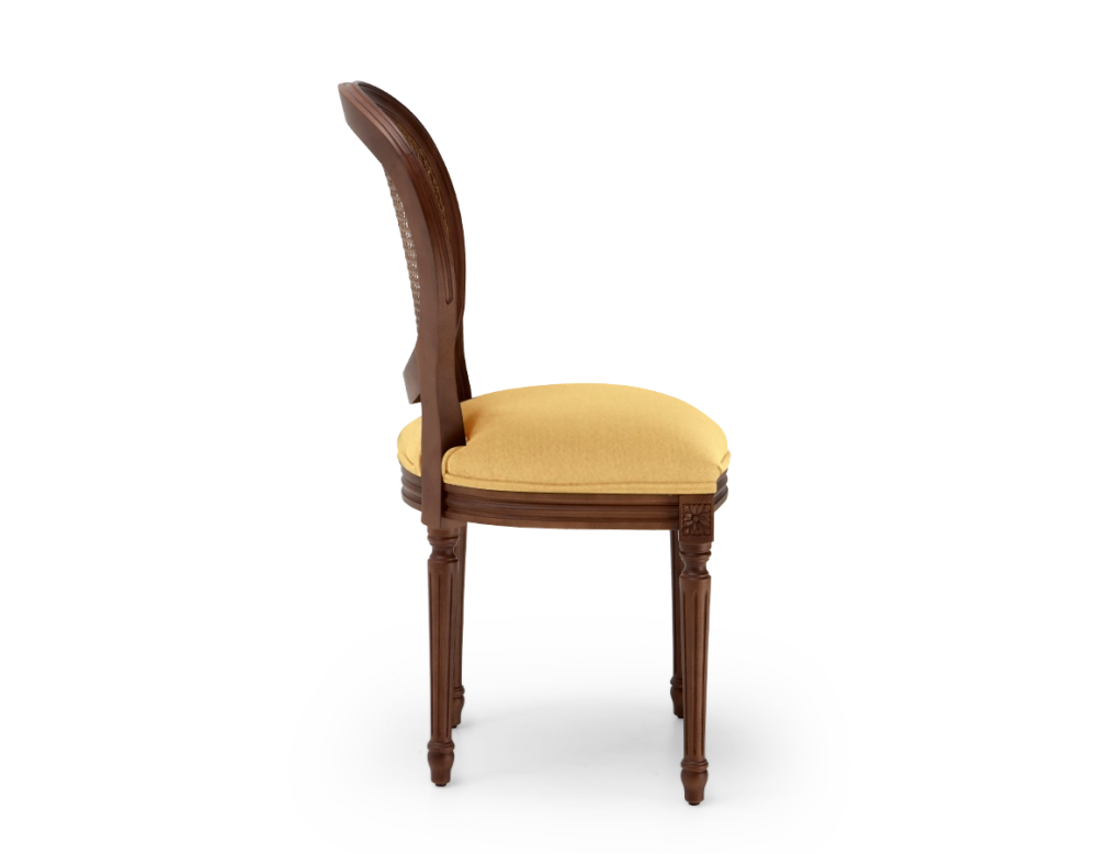 Louis XVI style antique chair dark brown stained wood with cane backrest and yellow fabric seat. Louis XVI style antique chair dark brown stained wood with cane backrest and yellow fabric seat.