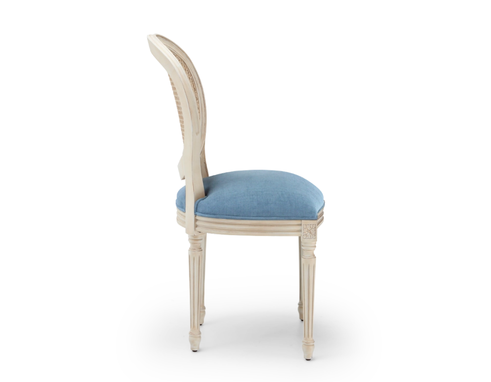 Louis XVI style antique chair wood with white cerused finish, caned backrest, and blue denim seat. Louis XVI style antique chair wood with white cerused finish, caned backrest, and blue denim seat.