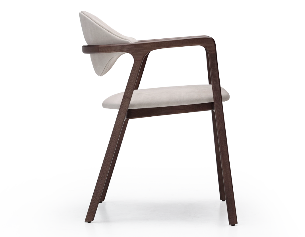 Designer armchair dark brown stained wood and sand velvet fabric. Designer armchair dark brown stained wood and sand velvet fabric.