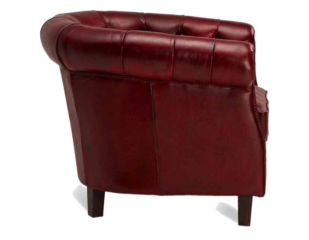 Sillón Chesterfield de piel rojo carmín reposabrazos con tachuelas