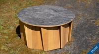 Round coffee table in oak and ceramic with natural wood finish and grey marble-effect ceramic top.