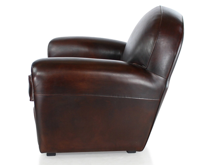 Fauteuil club cuir marron soutenu accoudoirs cloutés Fauteuil club cuir marron soutenu accoudoirs cloutés
