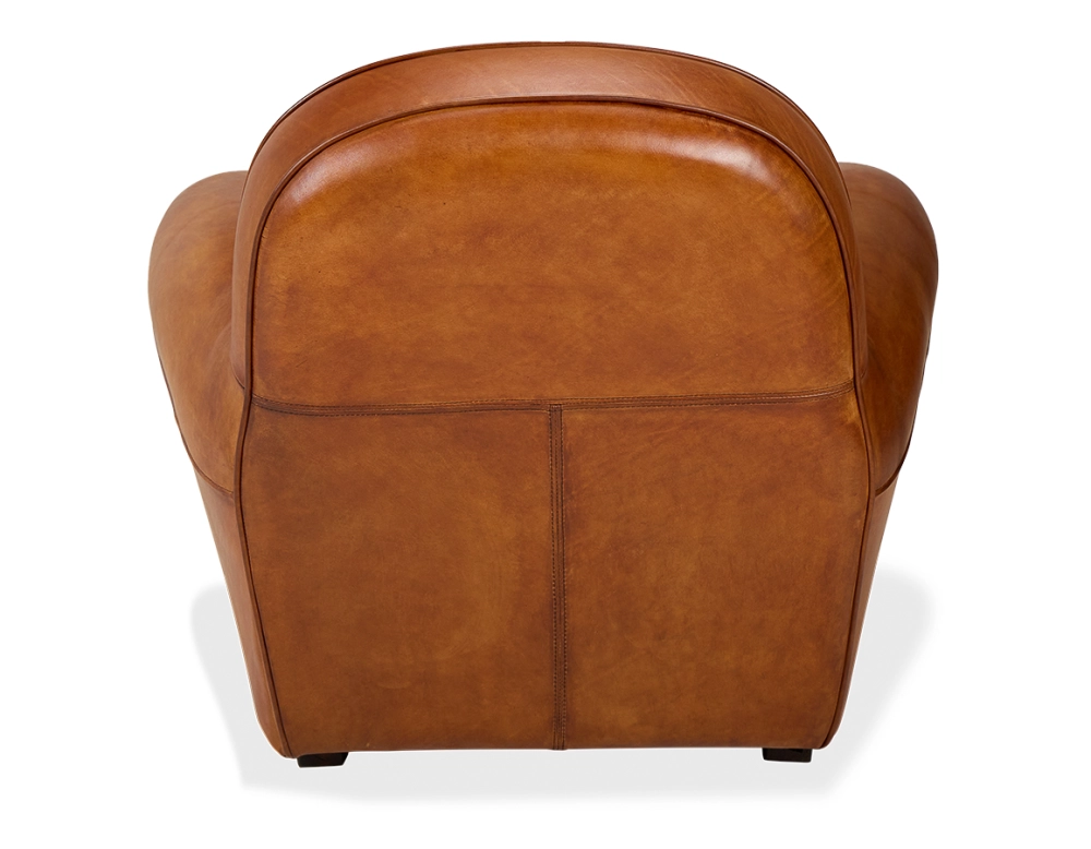 Leather club armchair light brown piped armrests Leather club armchair light brown piped armrests