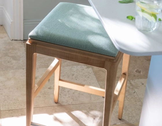 H80 cm designer bar stool natural tint wood, sage green leather seat