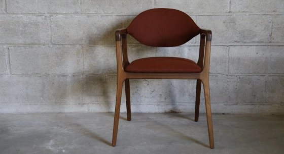 Walnut Designer armchair natural wood finish and brown fabric