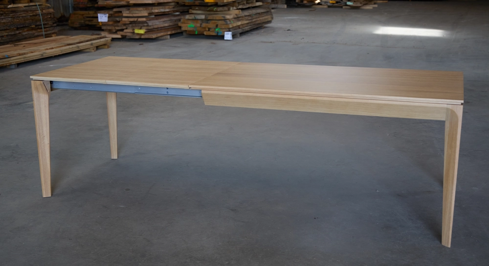 Table extensible 6 à 10 personnes en chêne allonges bois bois teinte naturelle 140x90 cm Table extensible 6 à 10 personnes en chêne allonges bois bois teinte naturelle 140x90 cm