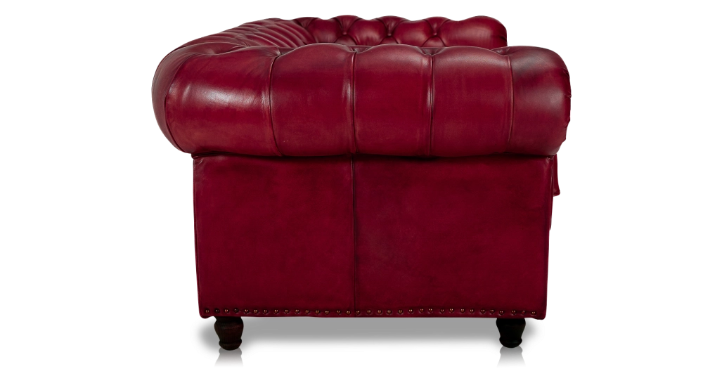 Canapé Chesterfield cuir 2 places rouge carmin accoudoirs cloutés Canapé Chesterfield cuir 2 places rouge carmin accoudoirs cloutés