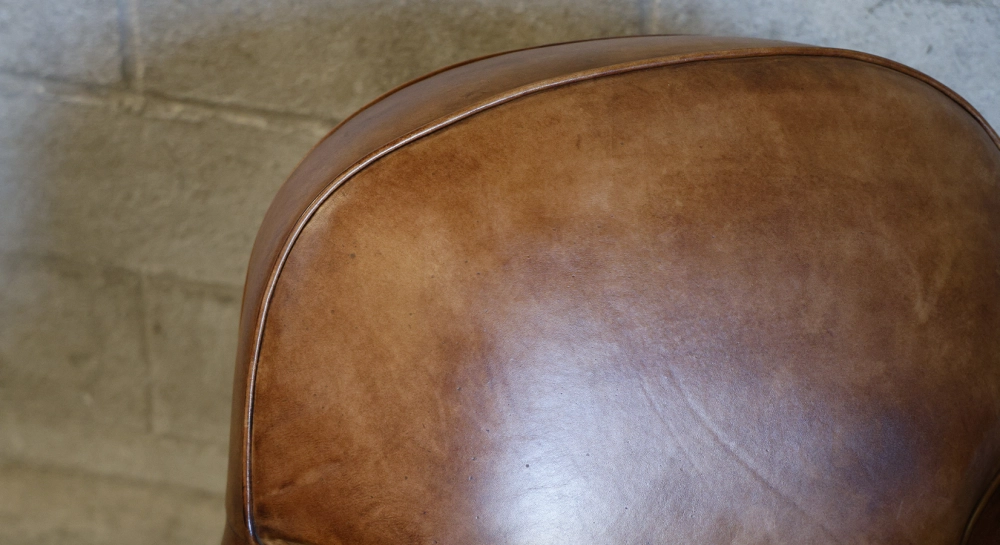 Leather club armchair dark brown studded armrests