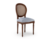 Louis XVI style antique chair dark brown stained wood with cane backrest and blue chevron fabric seat. Louis XVI style antique chair dark brown stained wood with cane backrest and blue chevron fabric seat.