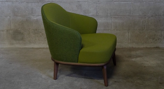 Fauteuil design tissu bi matière vert