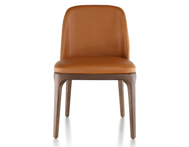 Designer chair dark brown stained wood and caramel leather Designer chair dark brown stained wood and caramel leather